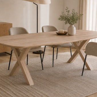 eettafel deens ovaal arc met drie stoelen en de tafel staat op een kleed