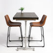 Industriële bartafel Los Angeles met zwart houten tafelblad en zilverkleurig stalen middenonderstel.