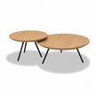Ronde salontafel Nova met naturel eiken tafelbladen en zwarte metalen poten
