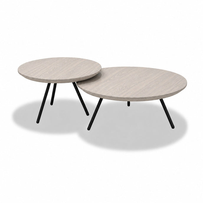 Ronde salontafel Nova met wit gebeitste eiken tafelbladen en zwarte metalen poten