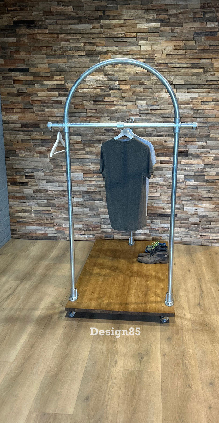 Steigerbuis kledingrek Boog